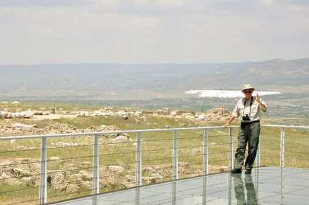 Ferrell Jenkins behind temple. The white spot 6 miles distance is Hierapolis. Photo ©Leon Mauldin.